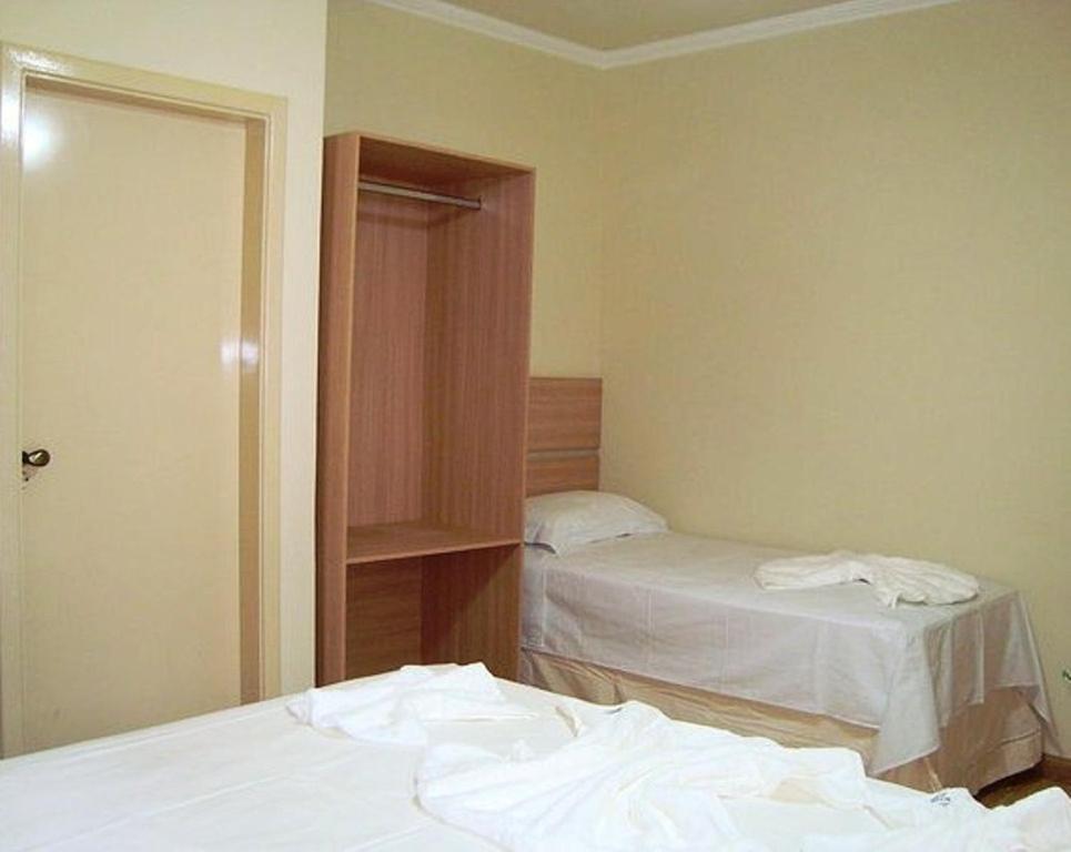 Hotel Perez Pouso Alegre Habitación foto